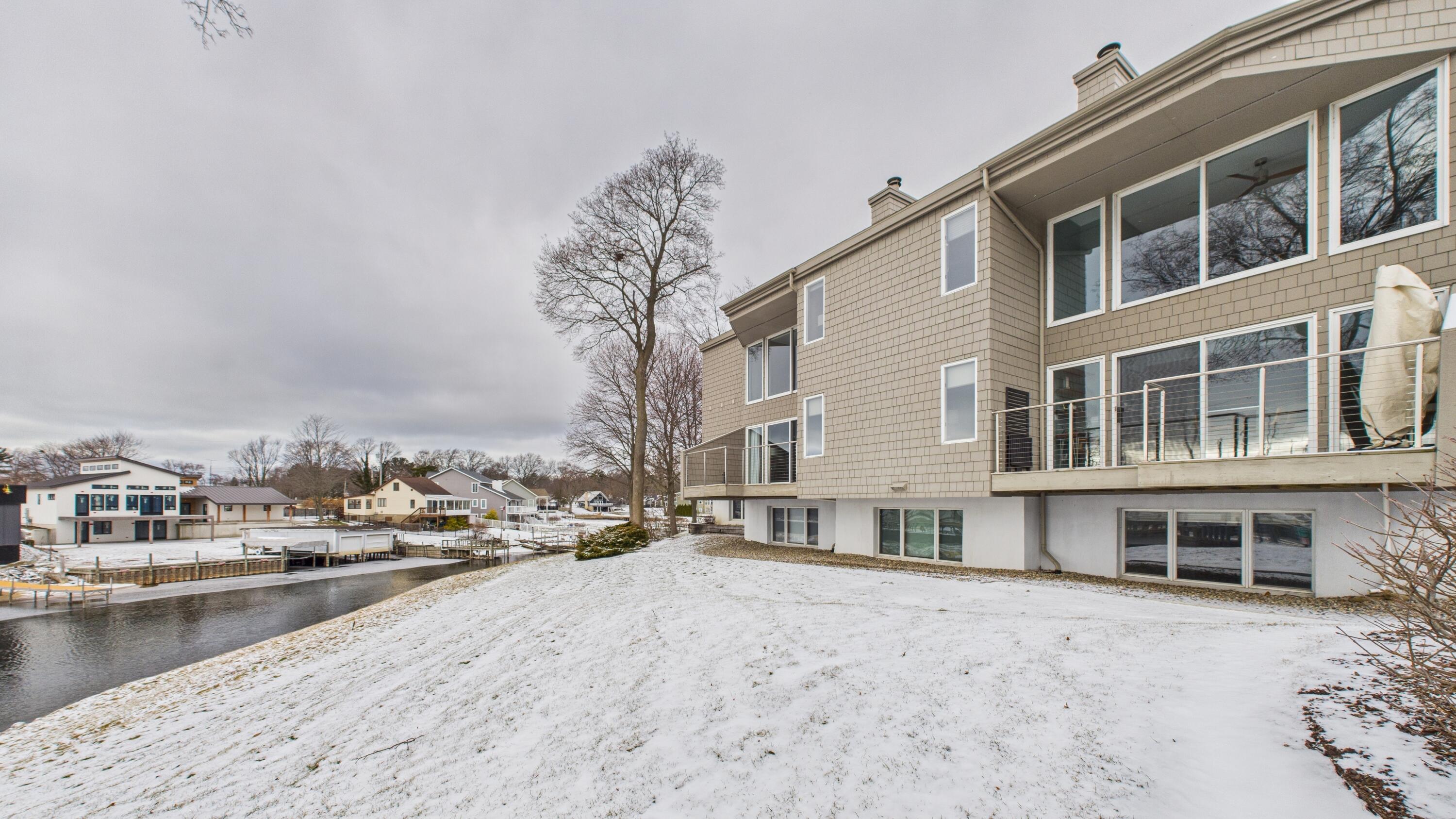 408 Ruddiman Drive, Unit 3 North Muskegon, MI 49445 - Photo 3 of 45 CAM04872G0-PR0053-STILL045