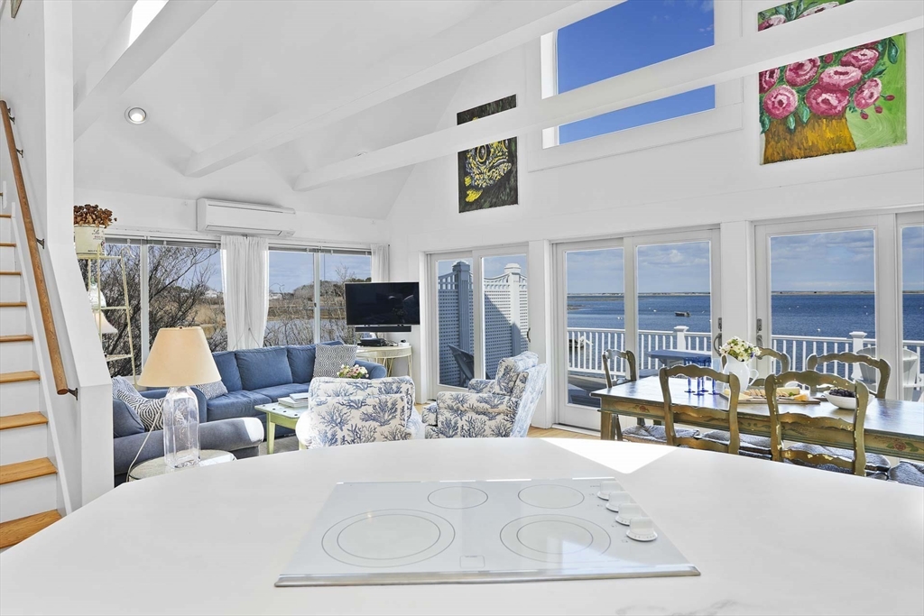 31 The Boulevard Edgartown, MA 02539 - Photo 15 of 39 a living room with furniture and a flat screen tv