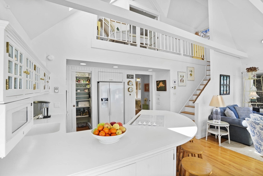 31 The Boulevard Edgartown, MA 02539 - Photo 17 of 39 a living room with furniture and a wooden floor