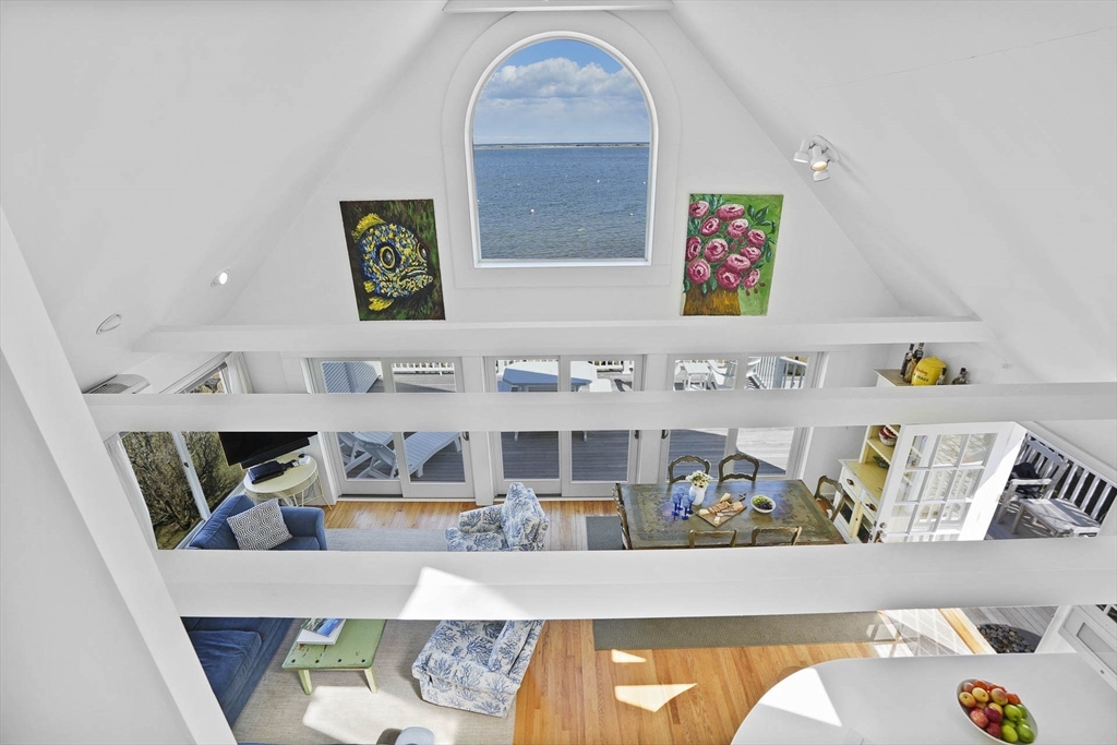 31 The Boulevard Edgartown, MA 02539 - Photo 25 of 39 a living room with furniture and a fireplace