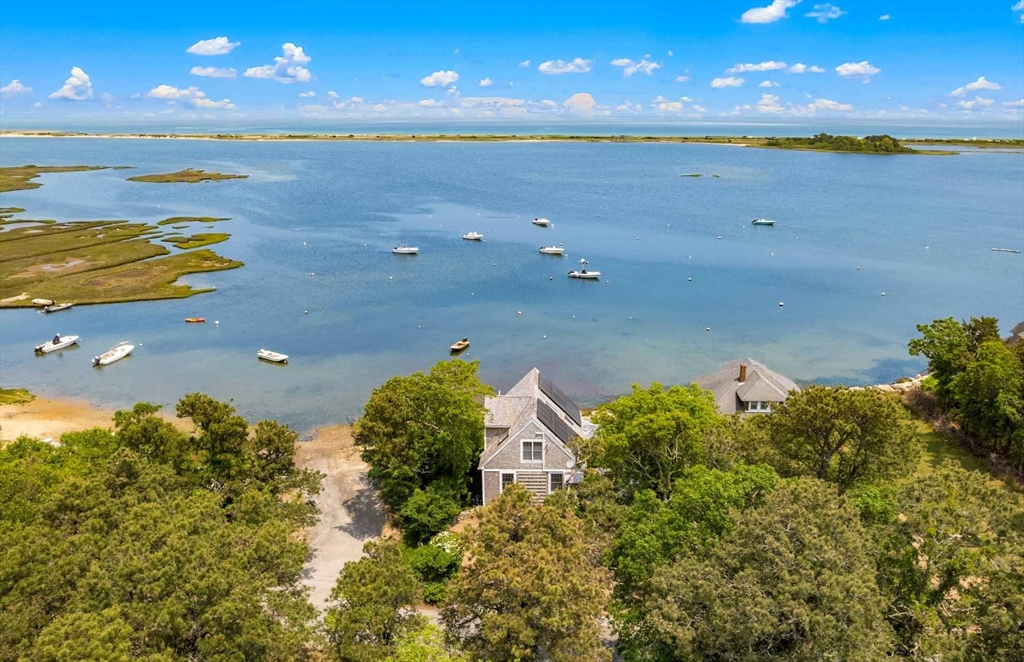 31 The Boulevard Edgartown, MA 02539 - Photo 3 of 39 a view of an ocean and a yard