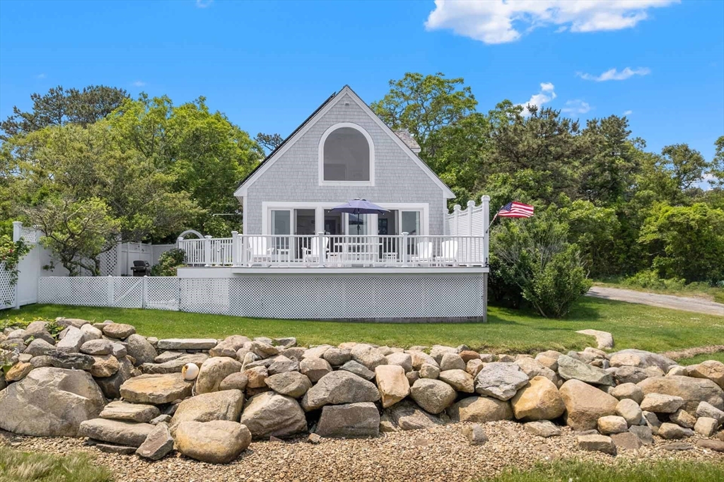 31 The Boulevard Edgartown, MA 02539 - Photo 32 of 39 a view of a house with swimming pool in front of it