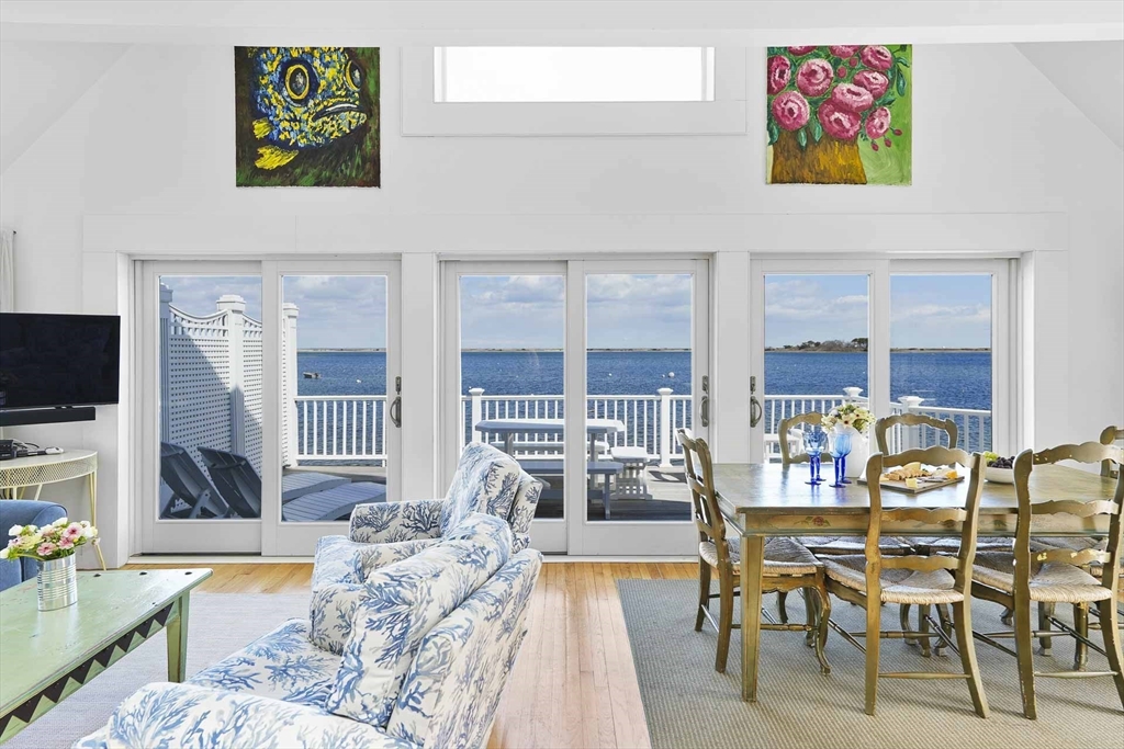 31 The Boulevard Edgartown, MA 02539 - Photo 7 of 39 a living room with furniture and a flat screen tv