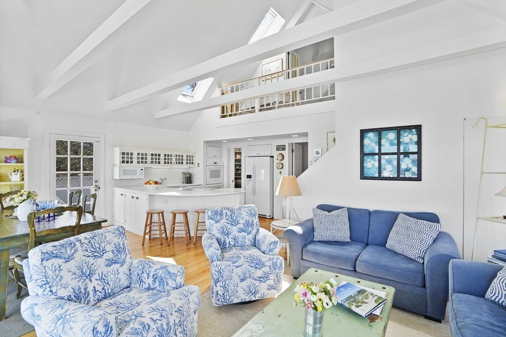 31 The Boulevard Edgartown, MA 02539 - Photo 9 of 39 a living room with furniture and a large window