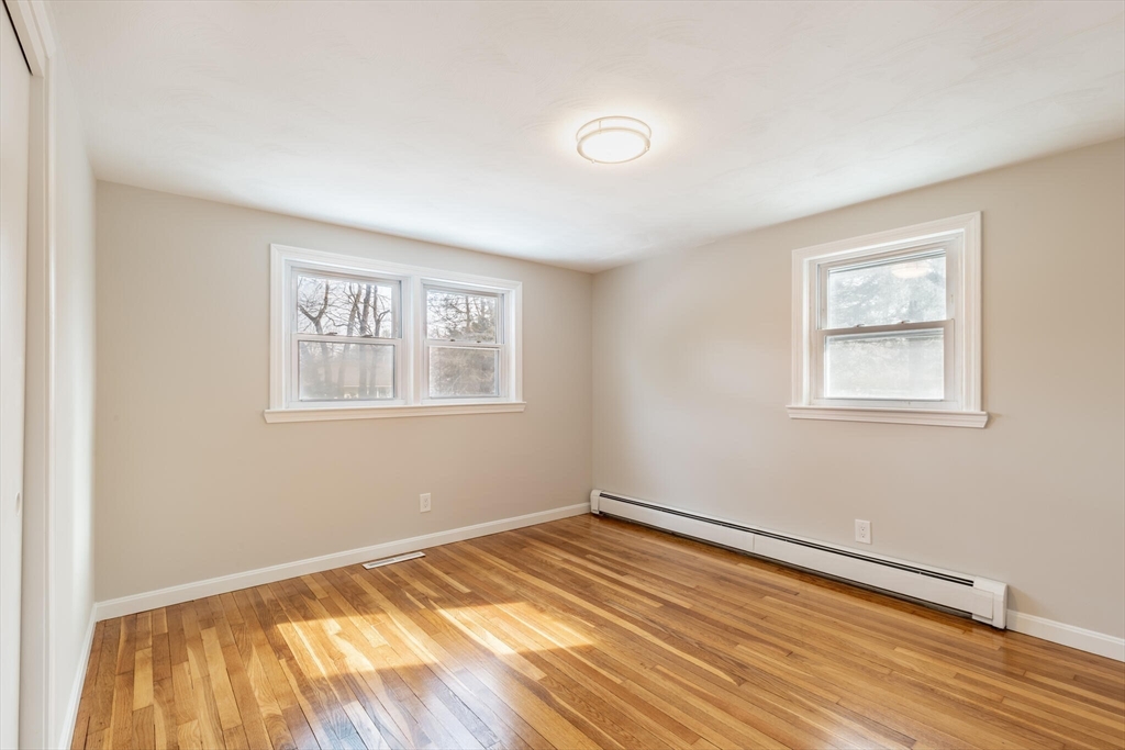 123 Lowell Road Pepperell, MA 01463 - Photo 14 of 30 a view of a room with wooden floor and window