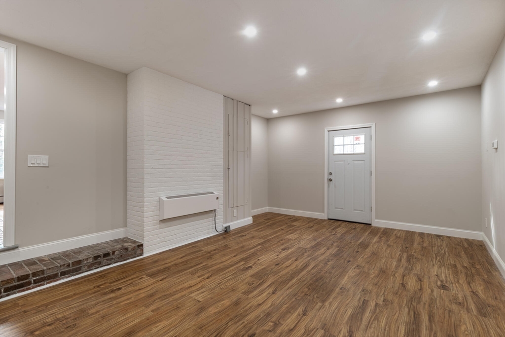 123 Lowell Road Pepperell, MA 01463 - Photo 19 of 30 wooden floor in an empty room with a window