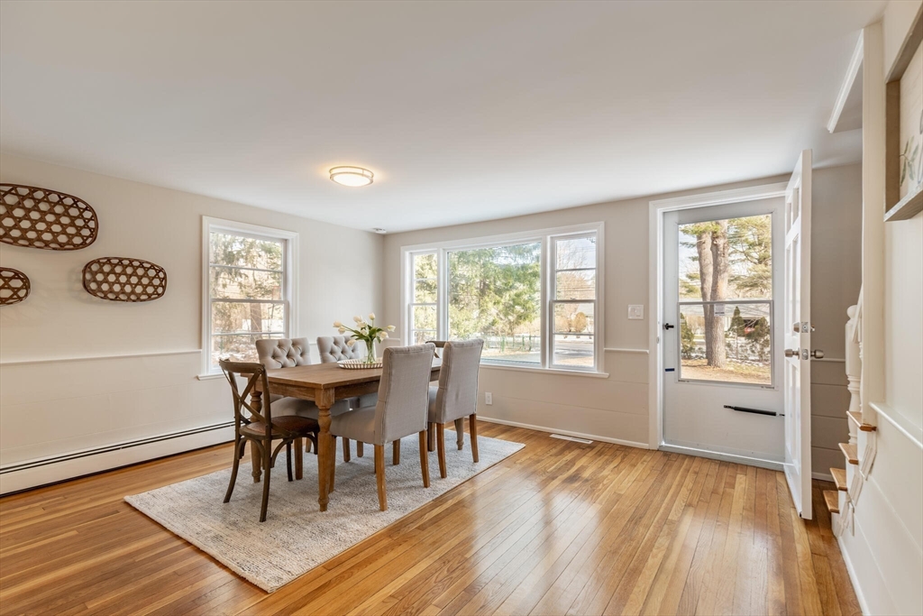 123 Lowell Road Pepperell, MA 01463 - Photo 21 of 30 a view of a dining room with furniture window and wooden floor