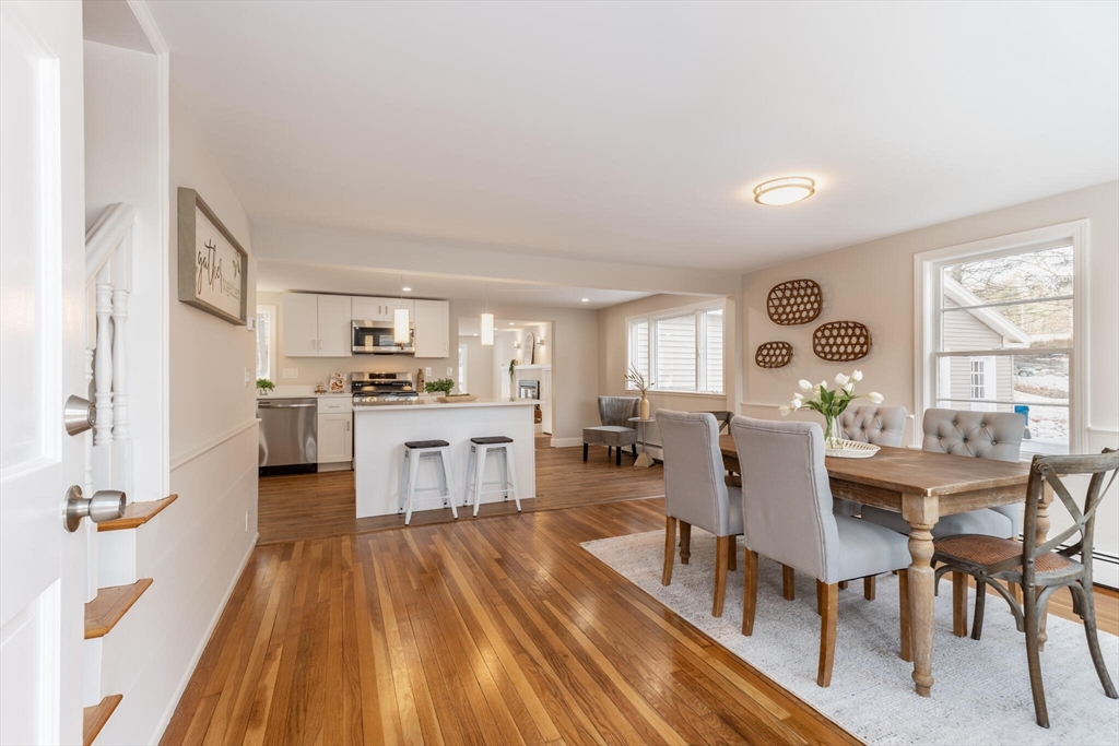 123 Lowell Road Pepperell, MA 01463 - Photo 6 of 30 a view of a dining room with furniture window and wooden floor