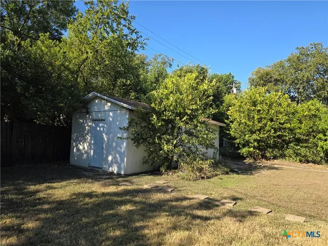 a view of outdoor space and yard