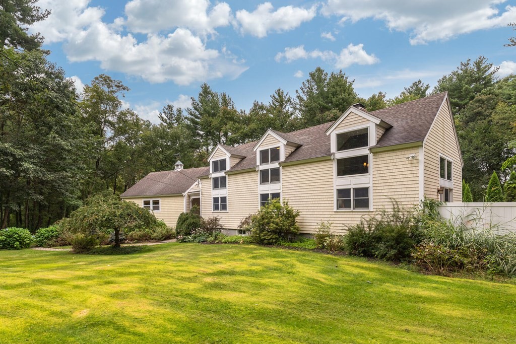 373 Ipswich Road Boxford, MA 01921 - Photo 1 of 37 a front view of a house with swimming pool