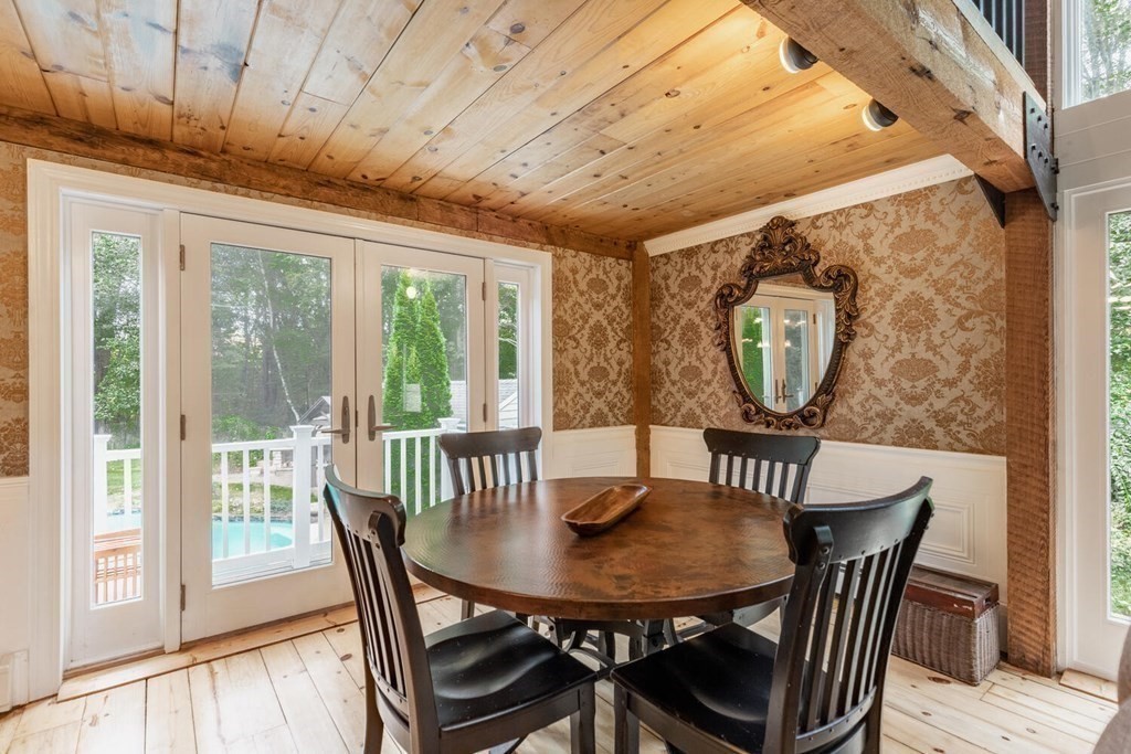 373 Ipswich Road Boxford, MA 01921 - Photo 15 of 37 a view of a dining room with furniture window and outside view