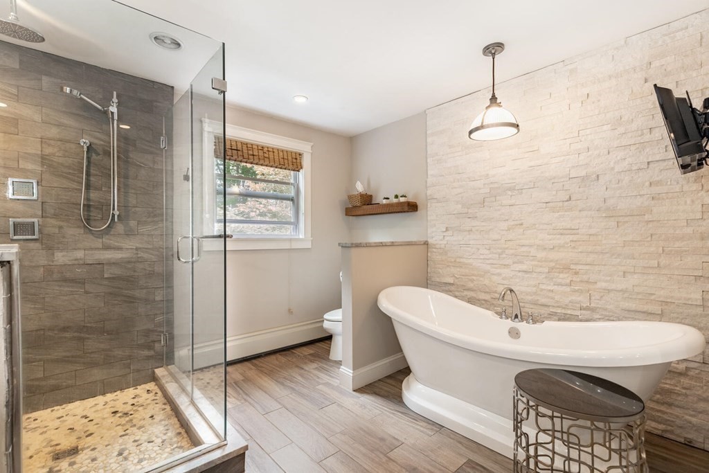 373 Ipswich Road Boxford, MA 01921 - Photo 19 of 37 a bathroom with a bathtub and shower