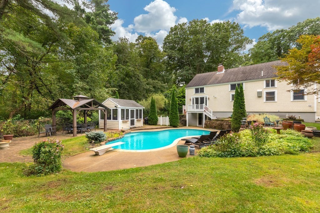 373 Ipswich Road Boxford, MA 01921 - Photo 2 of 37 a front view of a house with garden