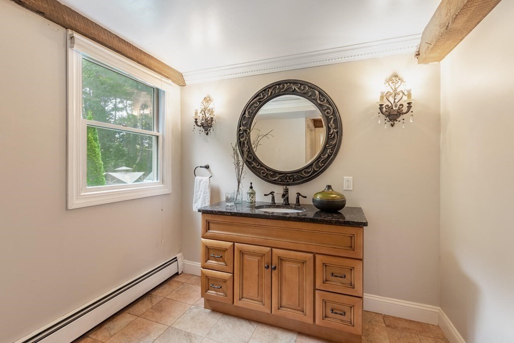 373 Ipswich Road Boxford, MA 01921 - Photo 25 of 37 a bathroom with a granite countertop double vanity sink and a mirror