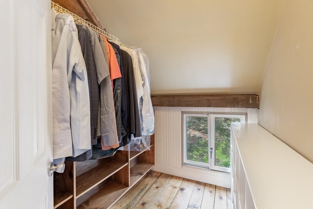 373 Ipswich Road Boxford, MA 01921 - Photo 28 of 37 a view of walk in closet with clothes and shoes