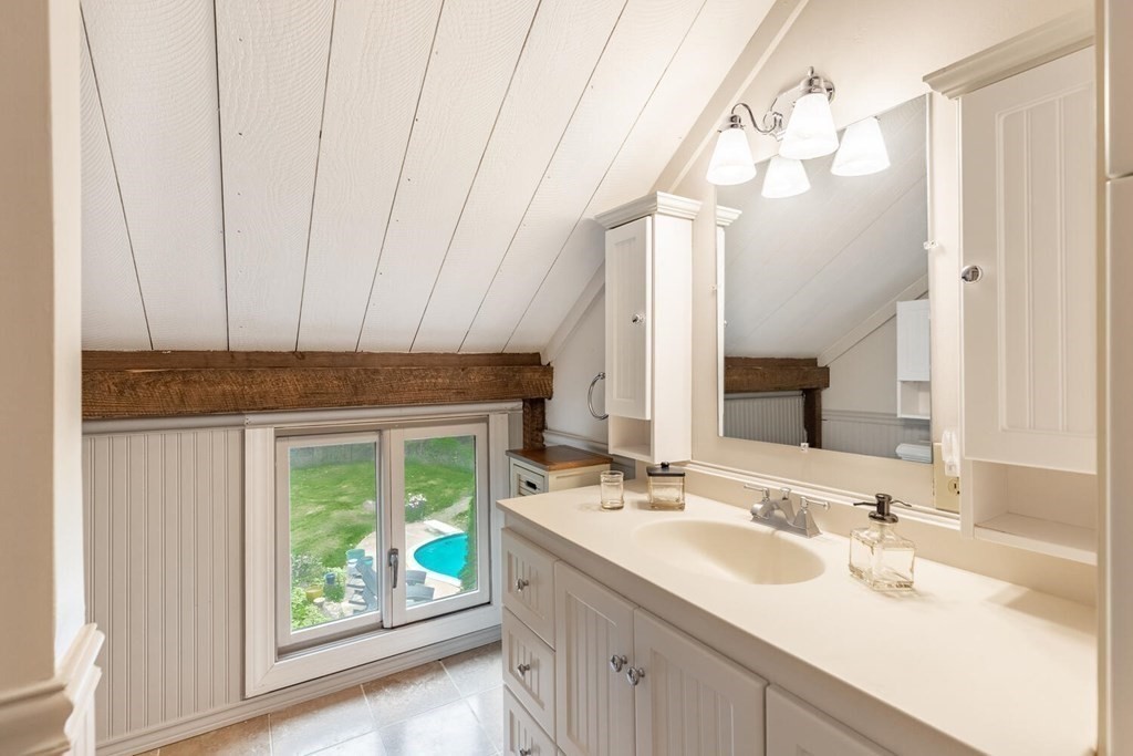 373 Ipswich Road Boxford, MA 01921 - Photo 29 of 37 a bathroom with a sink and a mirror
