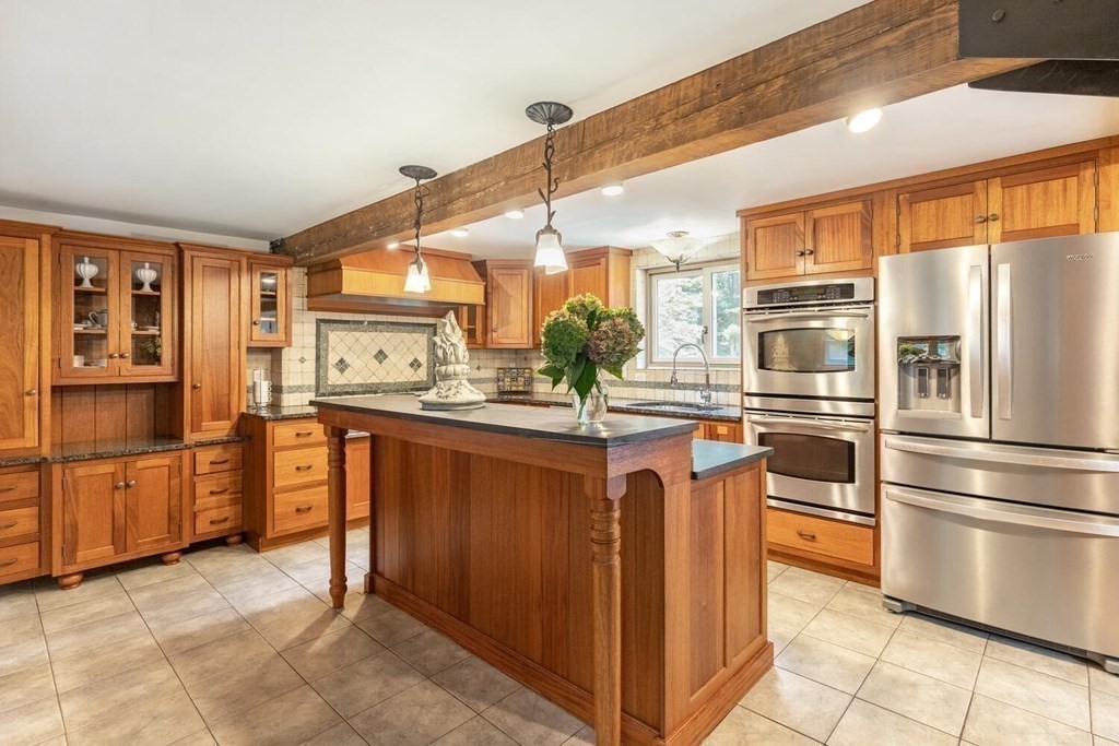 373 Ipswich Road Boxford, MA 01921 - Photo 7 of 37 a kitchen with stainless steel appliances granite countertop a refrigerator a oven a sink and dishwasher