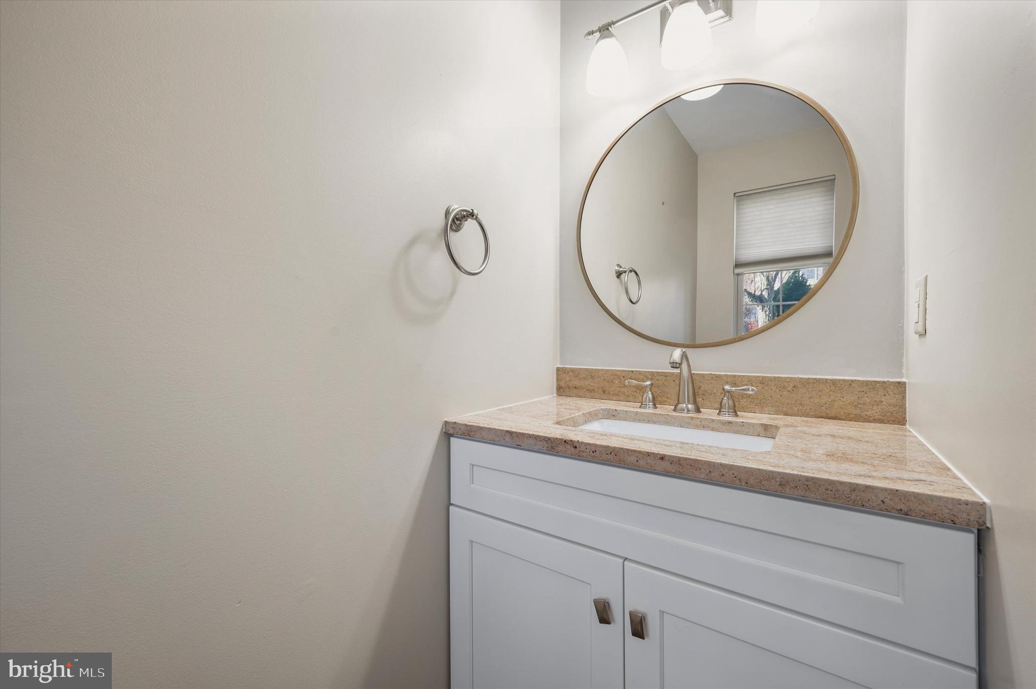 9 Meadow Lane Delran, NJ 08075 - Photo 7 of 15 a bathroom with a sink and a mirror