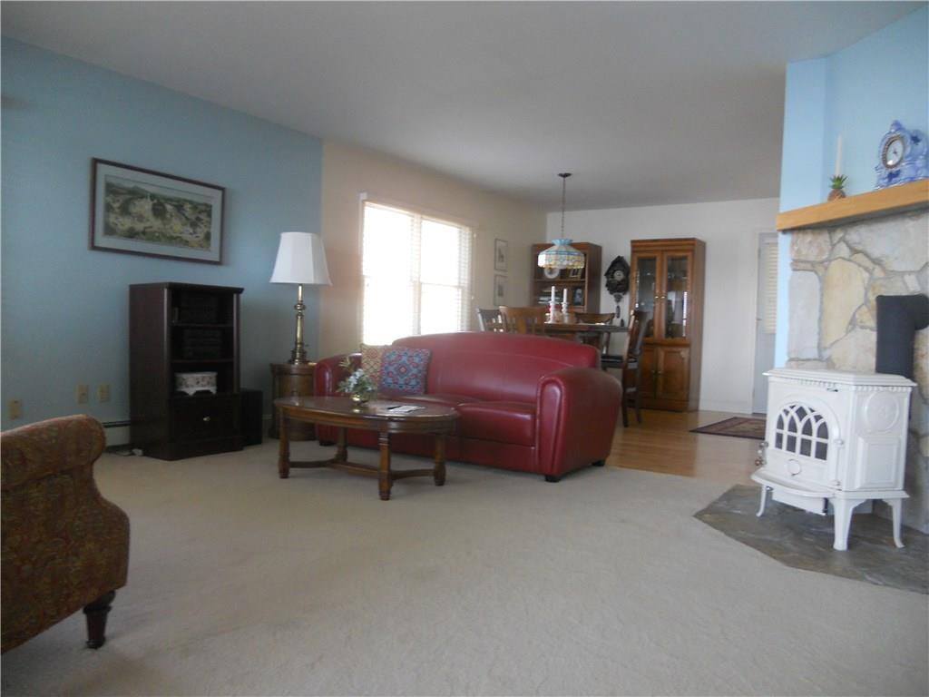 107 Cottage Road Windham, ME 04062 - Photo 8 of 24 The spacious carpeted living room is...