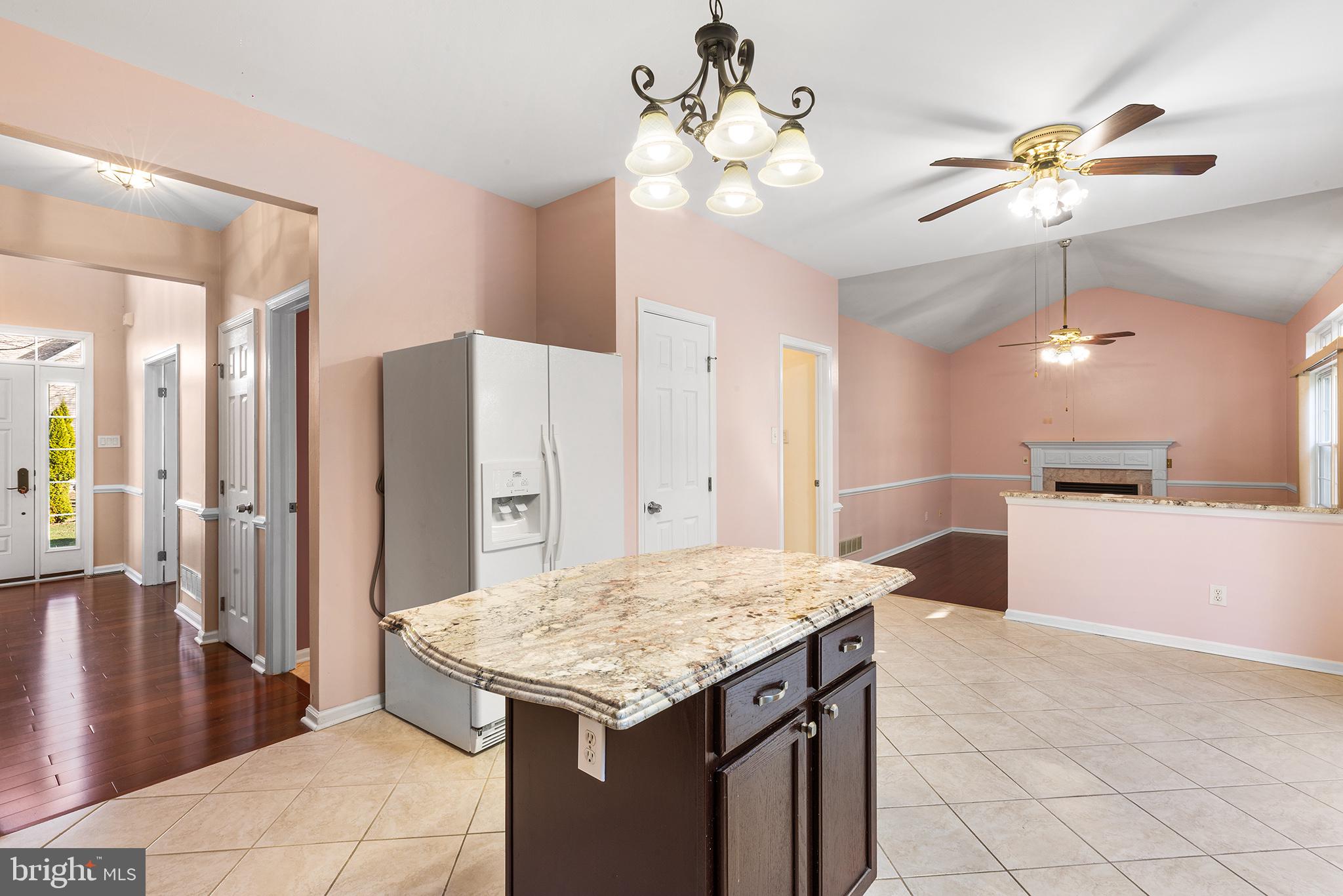 6 Sunset Hollow Road West Chester, PA 19380 - Photo 12 of 46 a kitchen with kitchen island a counter top space appliances and cabinets