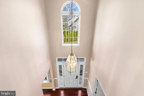a front view of a house with wooden floor