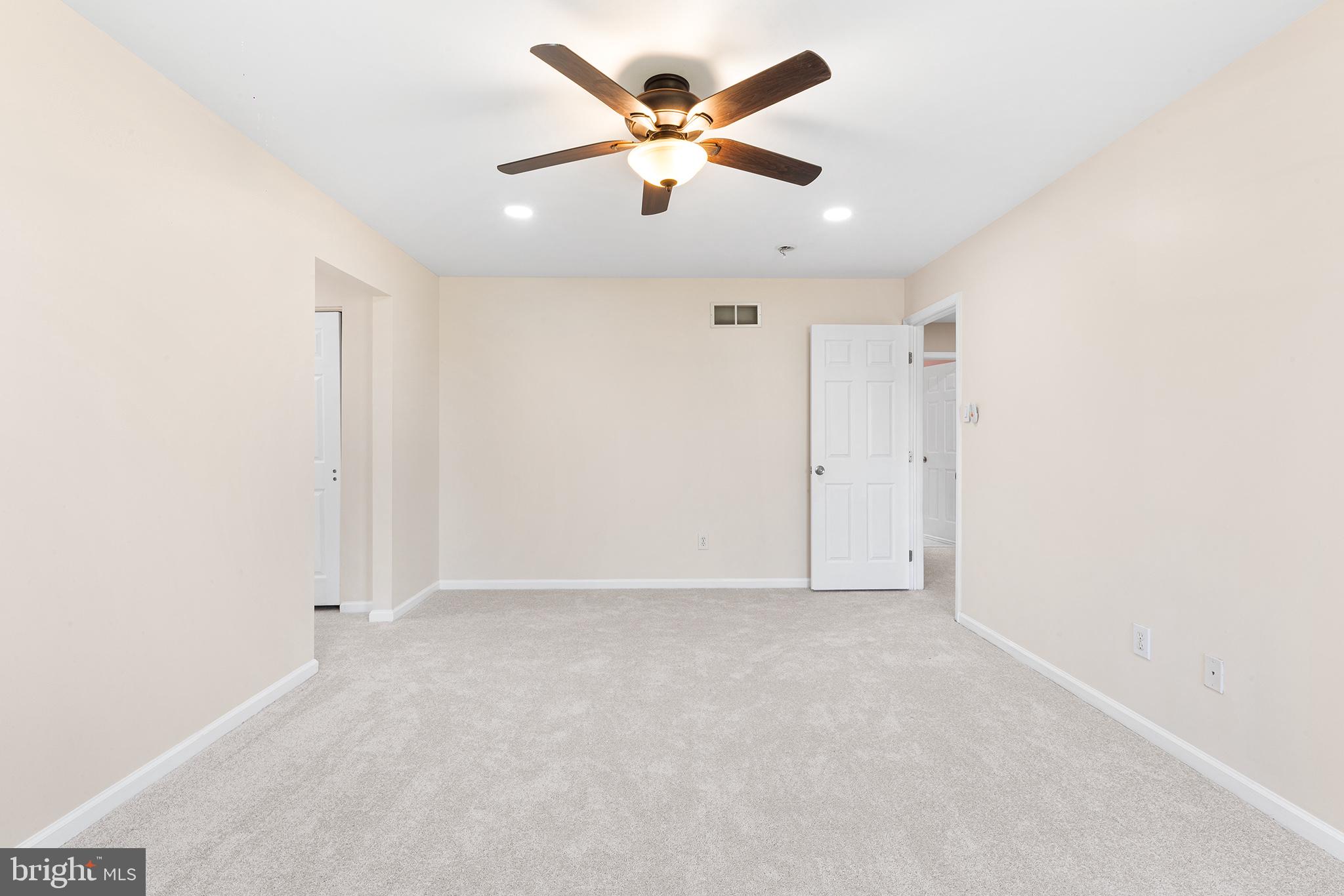 6 Sunset Hollow Road West Chester, PA 19380 - Photo 36 of 46 an empty room with chandelier fan