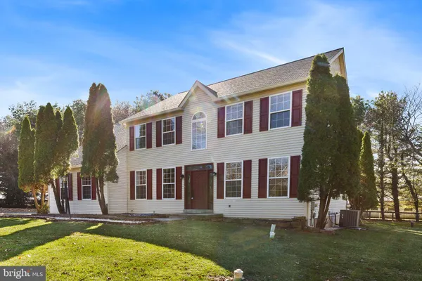 a front view of house with yard