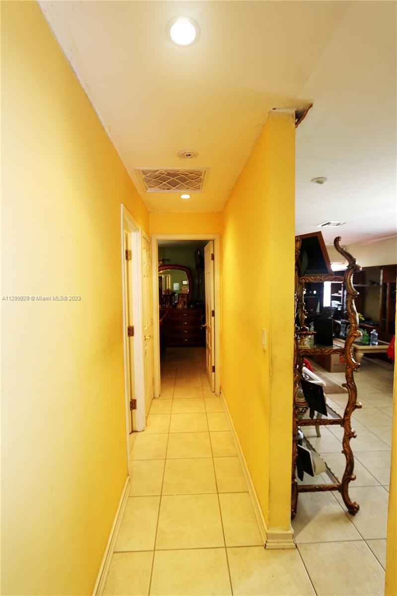 842 Southwest 89th Avenue, Unit A Miami, FL 33174 - Photo 24 of 34 a view of a patio with dining table and chairs