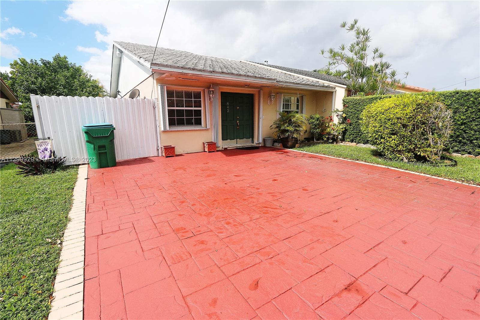 842 Southwest 89th Avenue, Unit A Miami, FL 33174 - Photo 3 of 34 a view of a house with backyard and garden