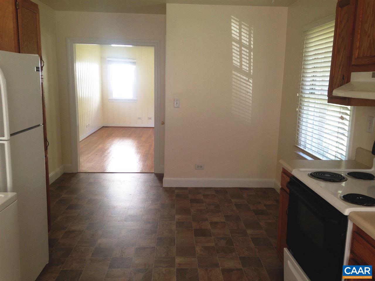 219 Shamrock Road Charlottesville, VA 22903 - Photo 7 of 12 a view of empty room with window and refrigerator