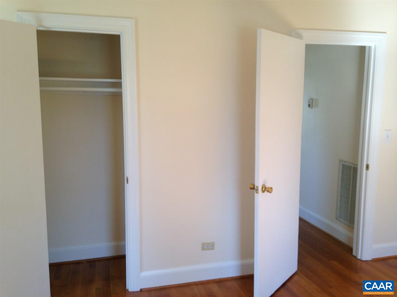 219 Shamrock Road Charlottesville, VA 22903 - Photo 9 of 12 a view of a hallway with wooden floor