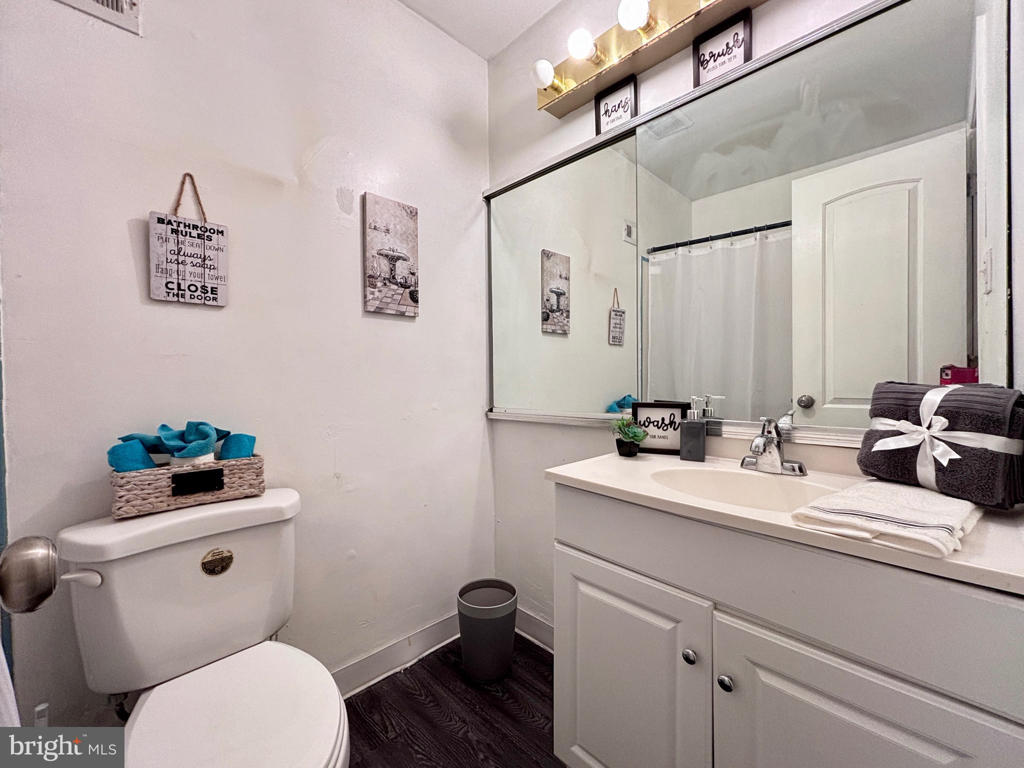 5205 Bay Road, Unit N Bensalem, PA 19020 - Photo 15 of 17 Hall bath with built-in mirrored cabinet