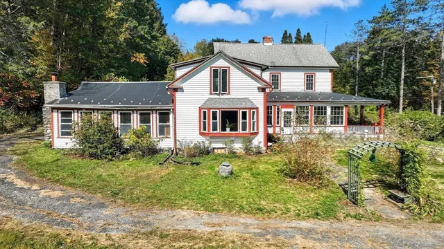 a house view with a garden space