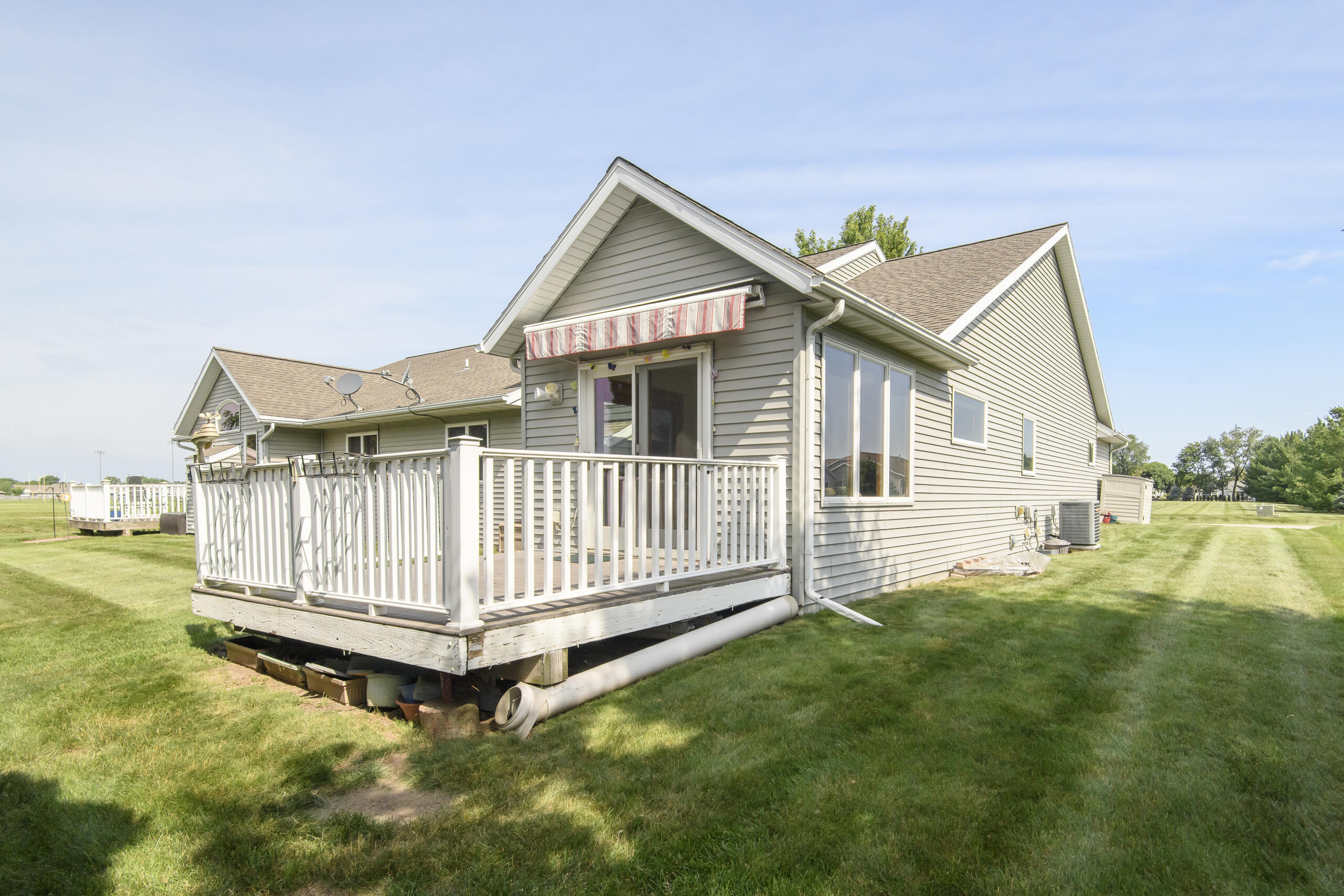 1610 Kyle Lane, Unit 28 Beloit, WI 53511 - Photo 27 of 35 Deck with Awnings