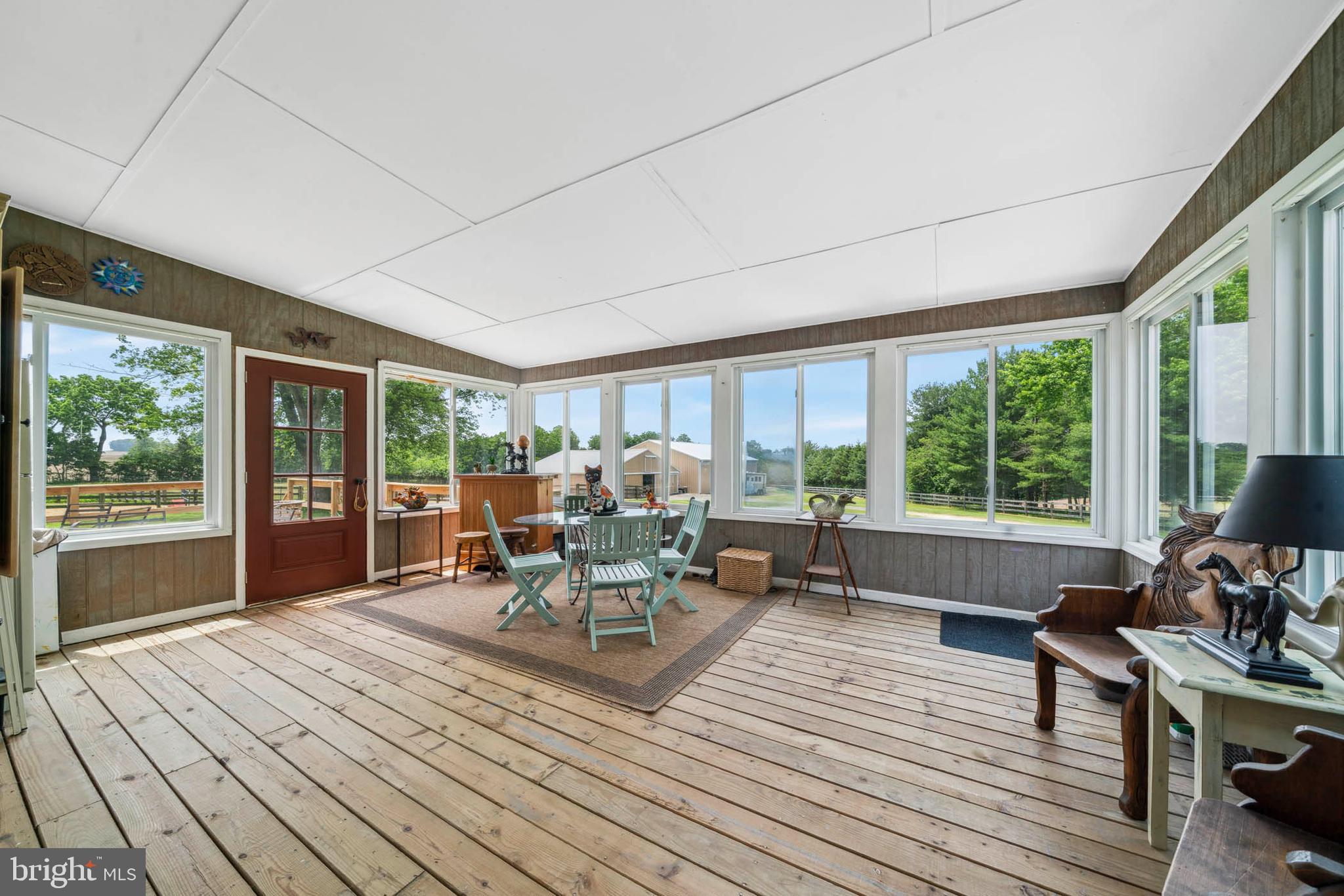 1392 Wakefield Valley Road New Windsor, MD 21776 - Photo 69 of 144 Enclosed sunroom off the kitchen and back deck