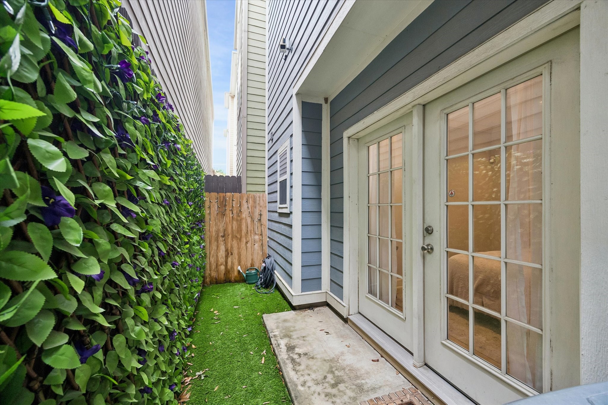 609 Rutland Street, Unit A Houston, TX 77007 - Photo 28 of 30 a view of a door with a door and wooden floor