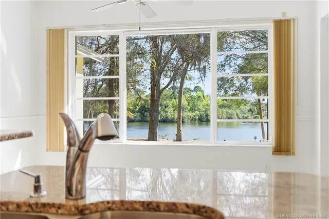 a view of a living room and window