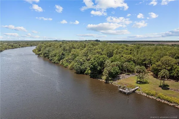 a view of a city street from a yard