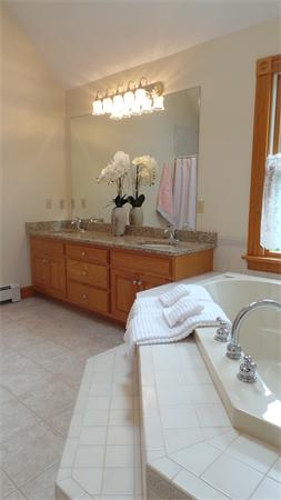 19 Carter Road Foxboro, MA 02035 - Photo 20 of 30 a bathroom with a granite countertop sink and a mirror