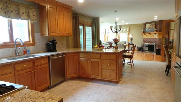 19 Carter Road Foxboro, MA 02035 - Photo 2 of 30 a kitchen with stainless steel appliances granite countertop a sink a stove and a refrigerator