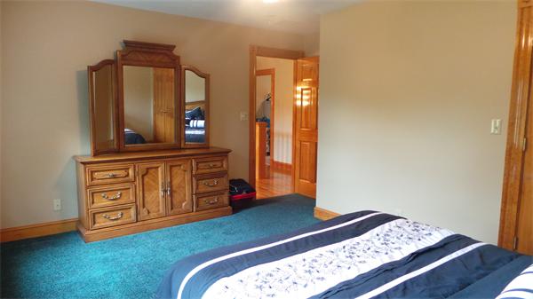 19 Carter Road Foxboro, MA 02035 - Photo 22 of 30 a bedroom with a bed and dresser