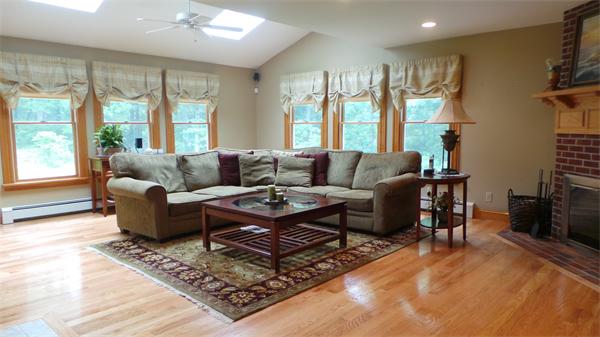 19 Carter Road Foxboro, MA 02035 - Photo 3 of 30 a living room with furniture and a large window