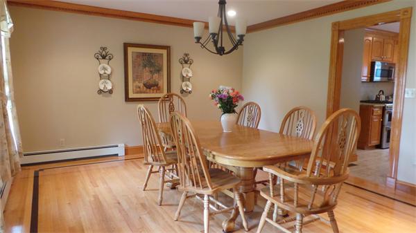 19 Carter Road Foxboro, MA 02035 - Photo 9 of 30 a view of a dining room with furniture and wooden floor