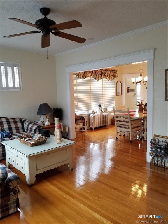 26 4th Street Hamden, CT 06514 - Photo 15 of 40 a bedroom with furniture and a large window