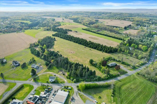 a view of a lake with a yard