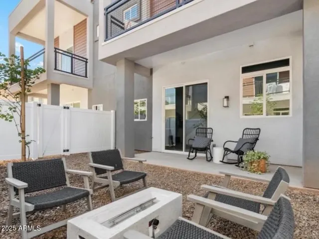 a building outdoor space with patio furniture