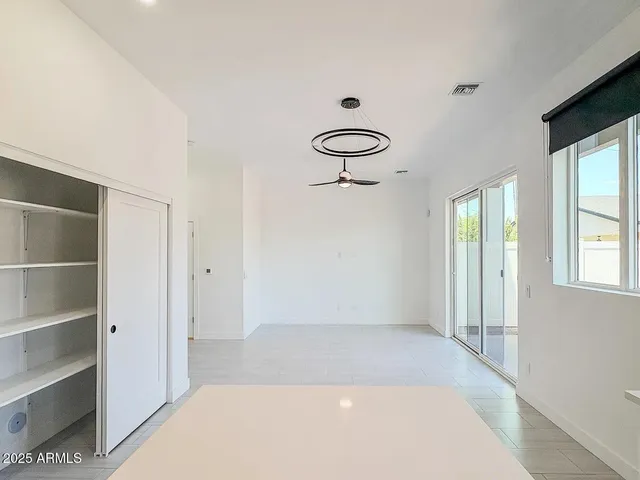 a view of a room with rack on the wall