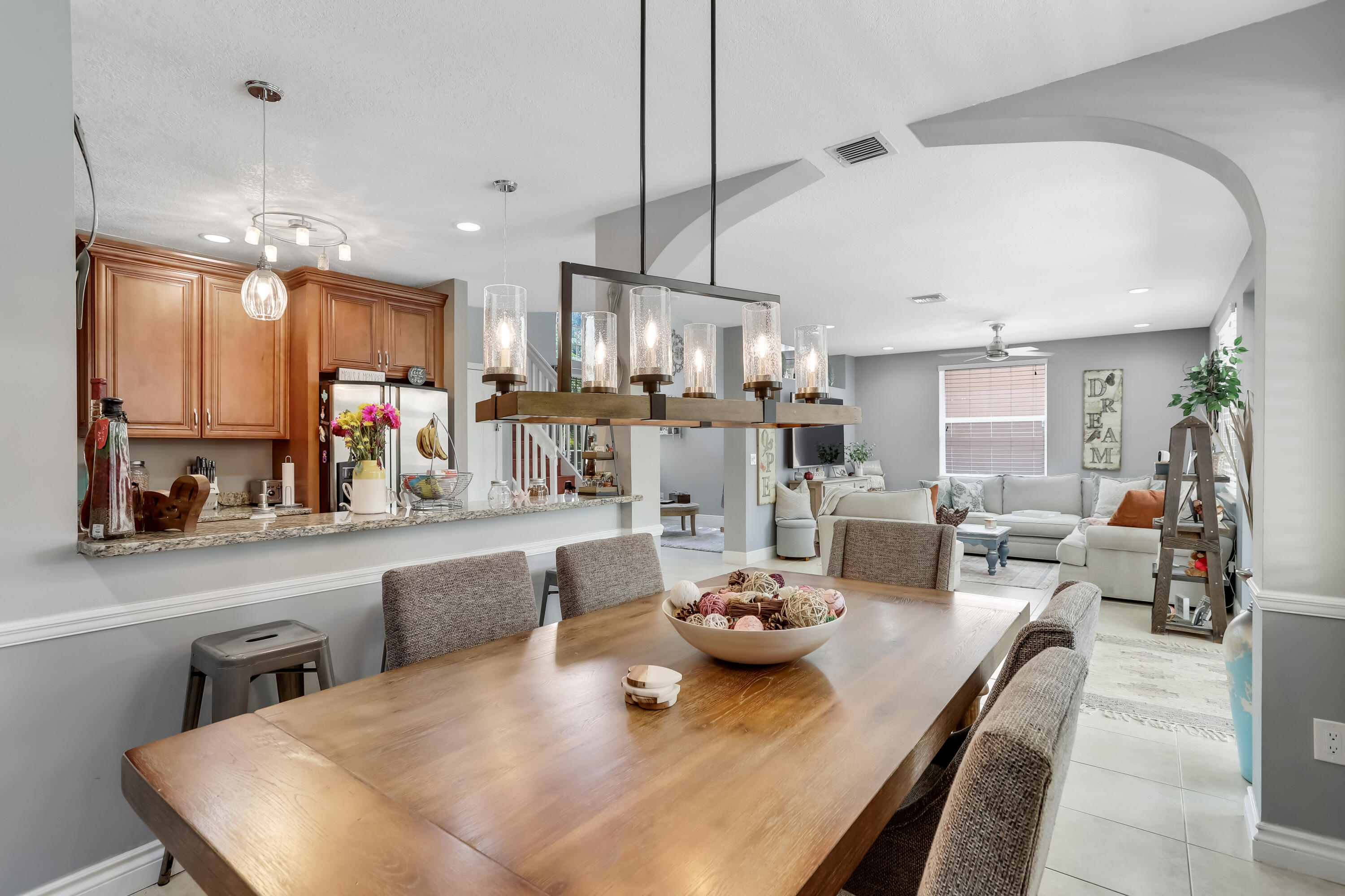 7855 Oak Grove Circle Lake Worth, FL 33467 - Photo 15 of 40 a large kitchen with a table and chairs