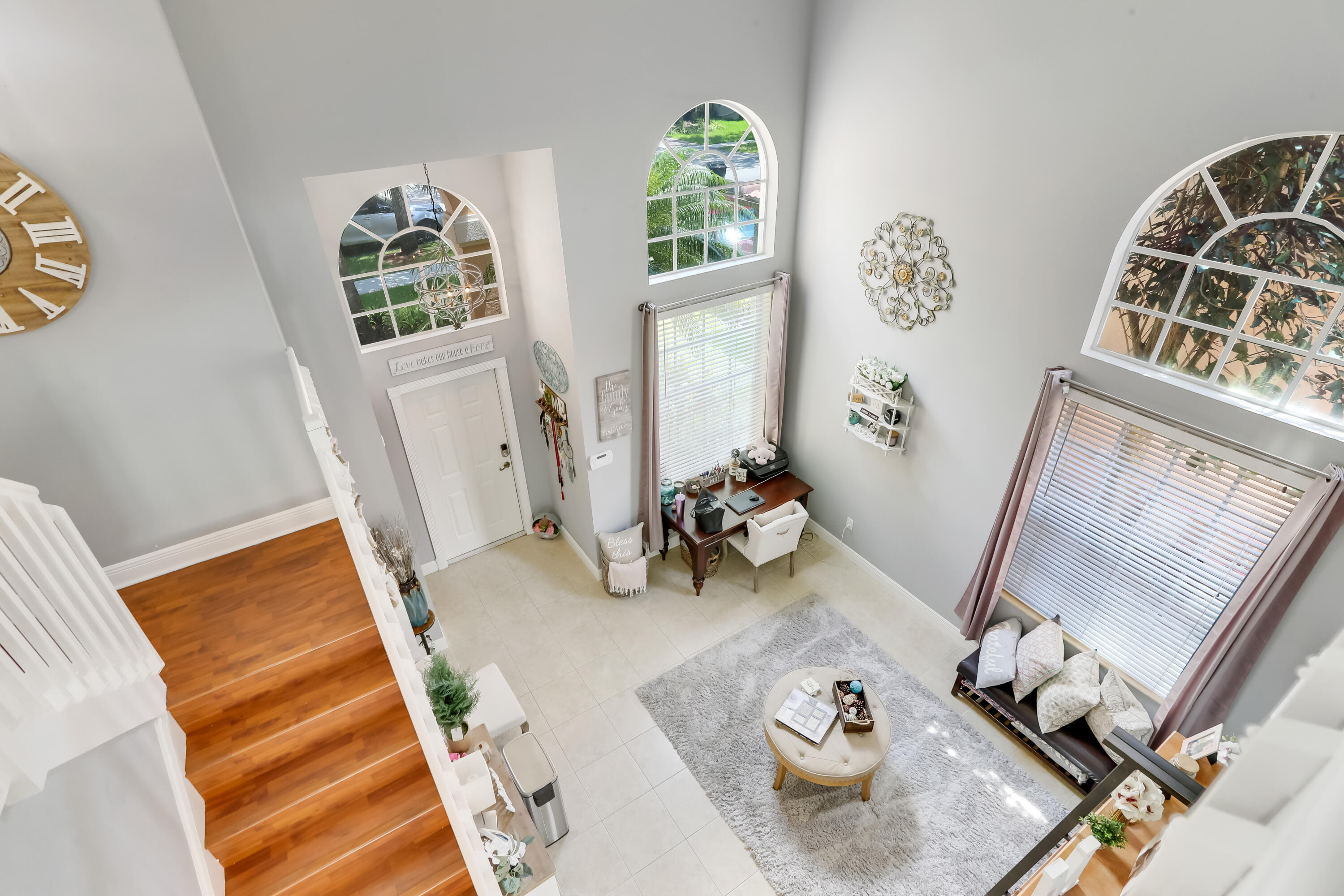 7855 Oak Grove Circle Lake Worth, FL 33467 - Photo 27 of 40 a view of living room with furniture and a window