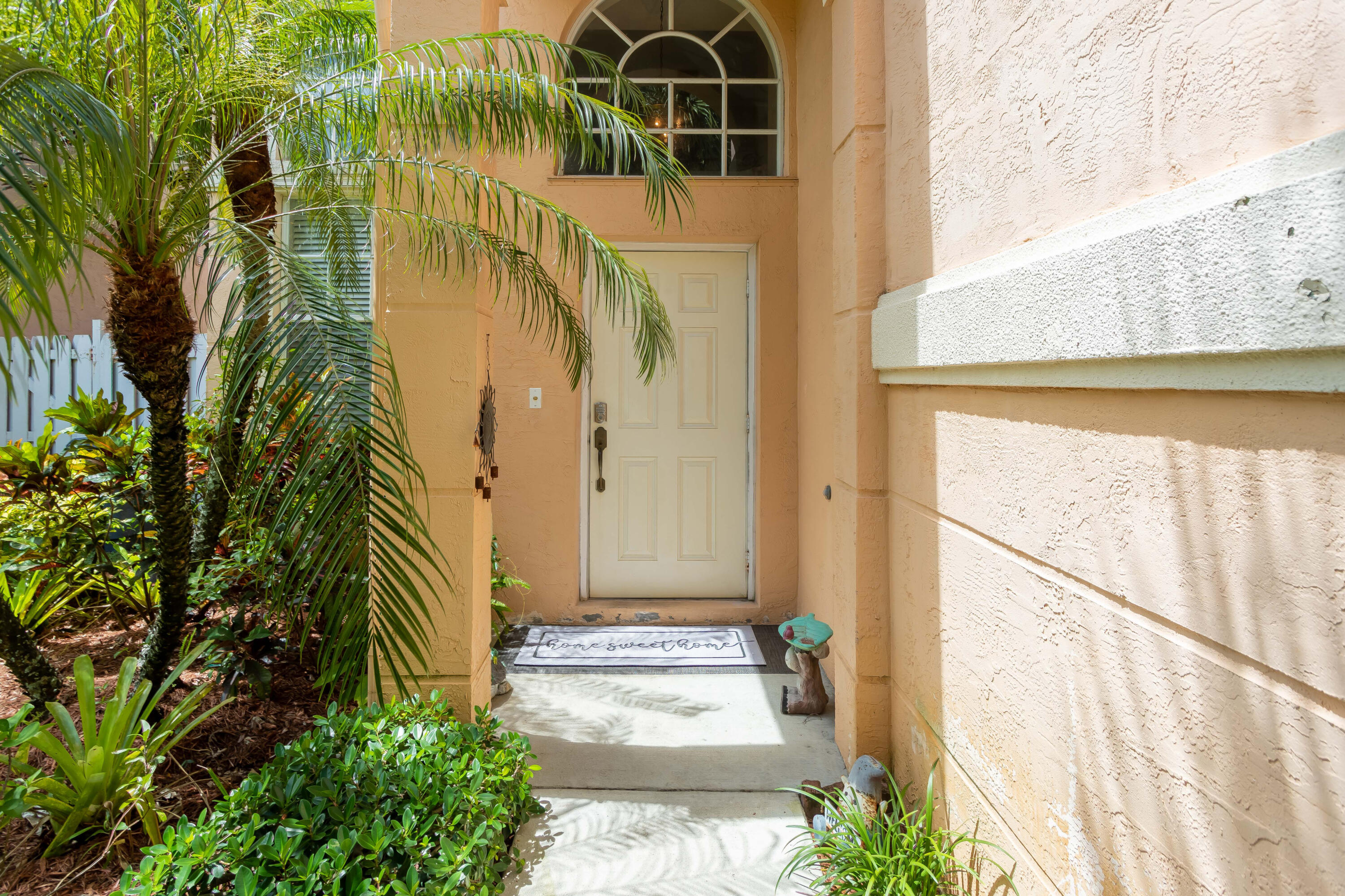 7855 Oak Grove Circle Lake Worth, FL 33467 - Photo 3 of 40 a view of a door front of a house